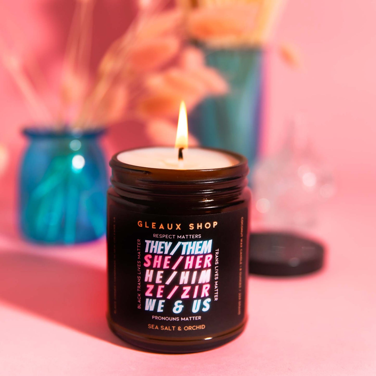 Trans Lives Matter sea salt orchid scented candle in amber glass