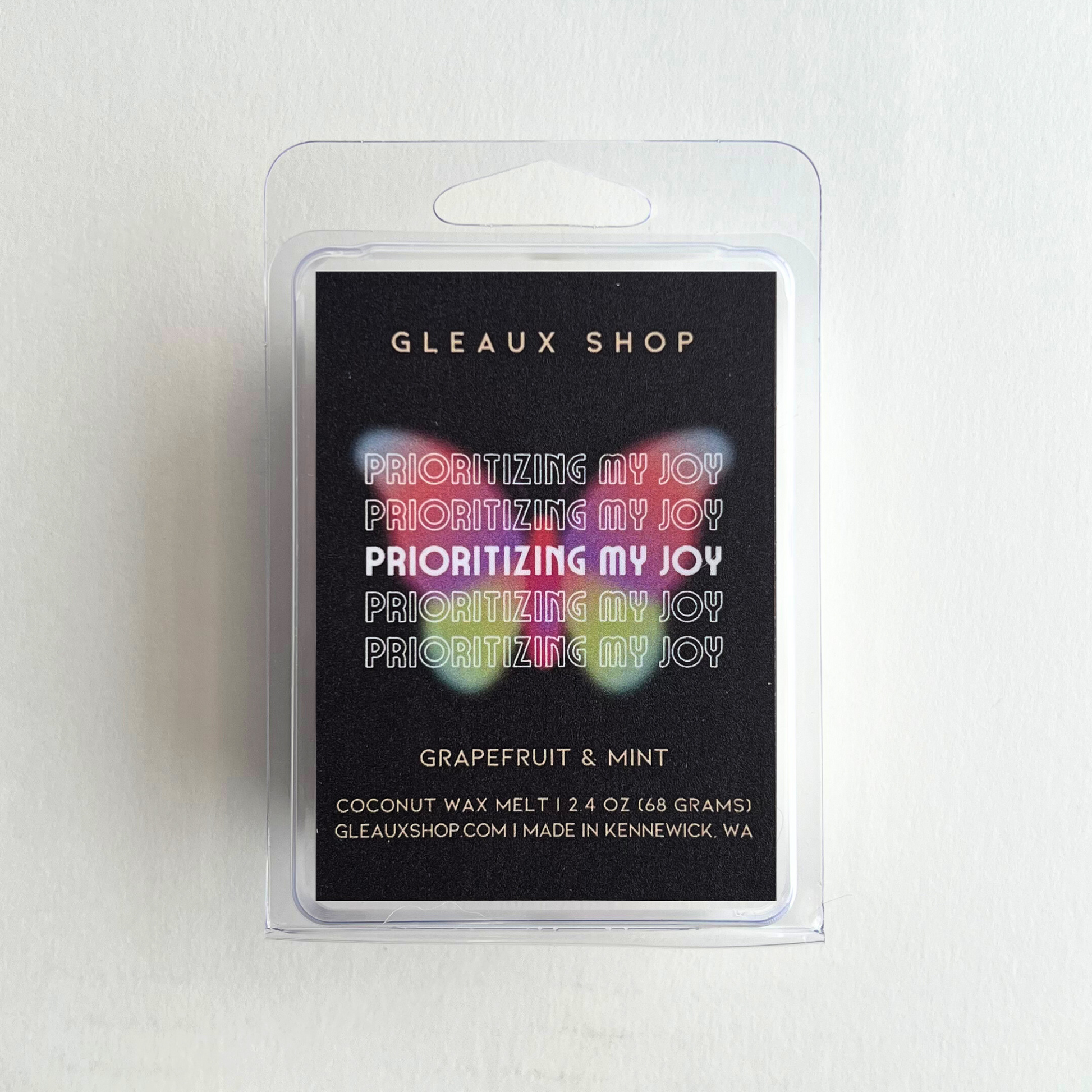 Grapefruit and mint scented wax melts by Gleaux Shop displayed in a minimalist setting