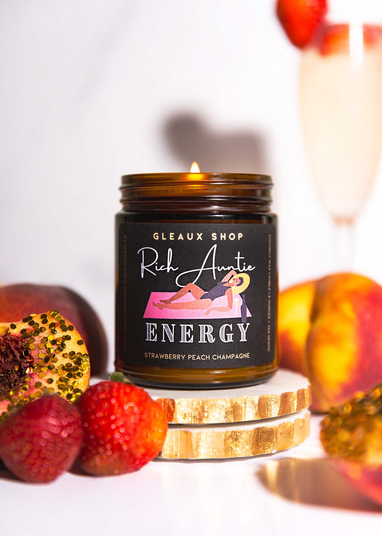 Gleaux Shop's Rich Auntie Energy: Strawberry Peach Champagne Scented Candle