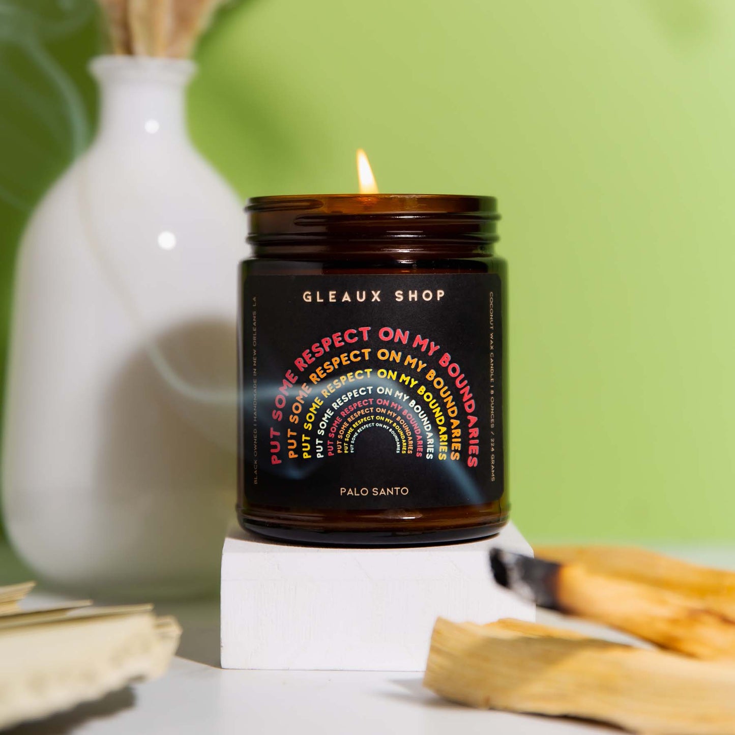 Palo Santo coconut wax candle in amber glass by Gleaux Shop
